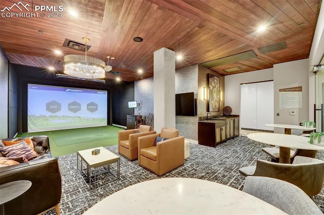 cinema room with wood ceiling and golf simulator