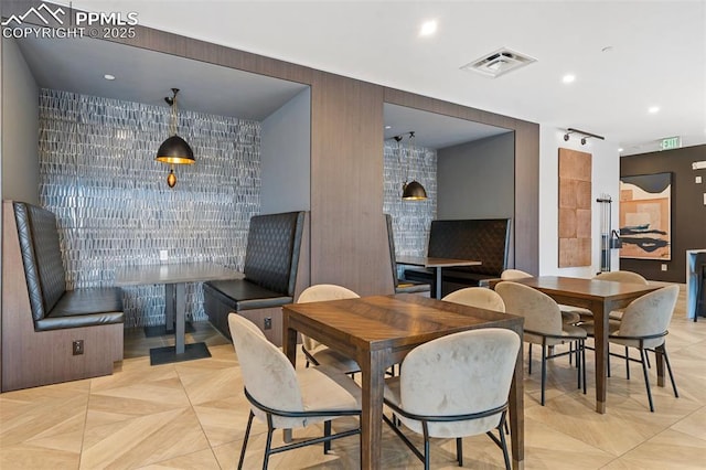 dining area featuring visible vents
