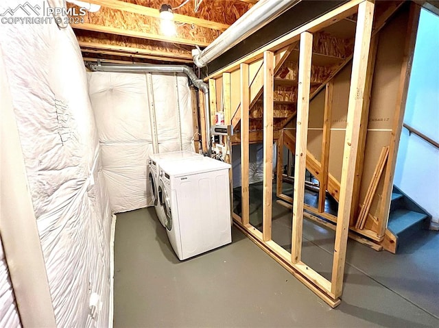 basement featuring separate washer and dryer