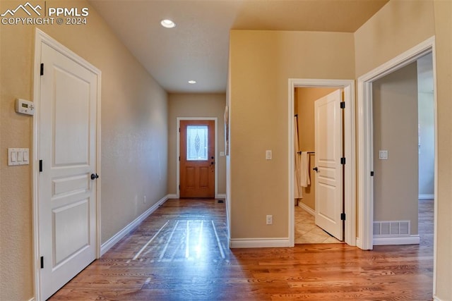 doorway featuring light wood-type flooring