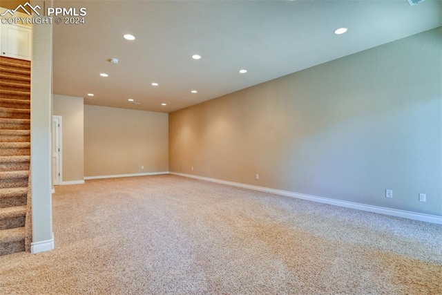 empty room with carpet flooring