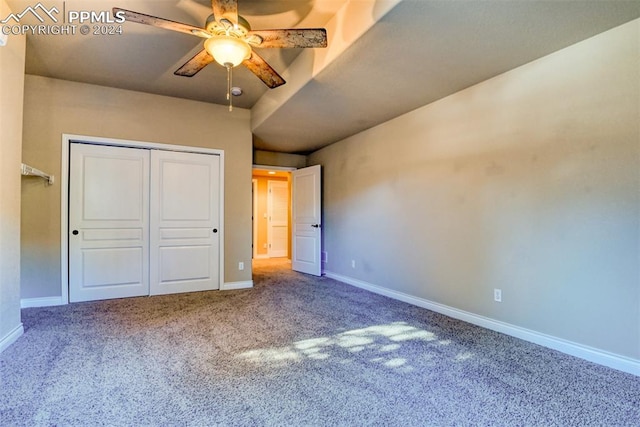 unfurnished bedroom with a closet, carpet floors, and ceiling fan