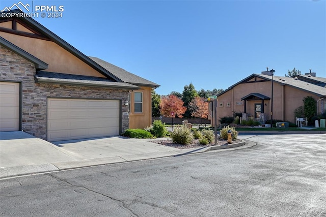 exterior space with a garage