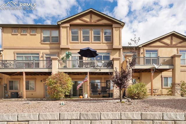 exterior space featuring a patio and a balcony