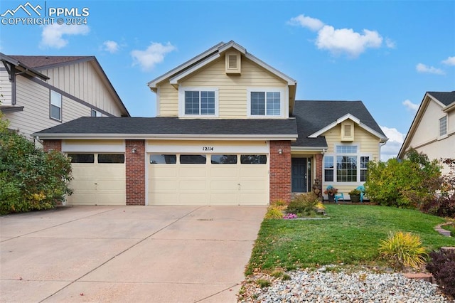 view of front of house with a front lawn