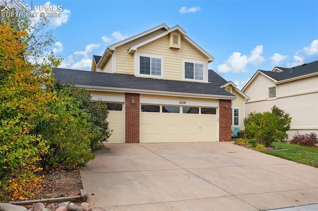 view of front of property with a garage