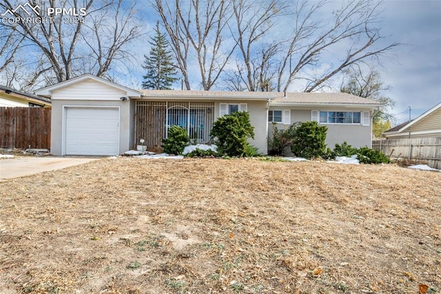 single story home with a garage