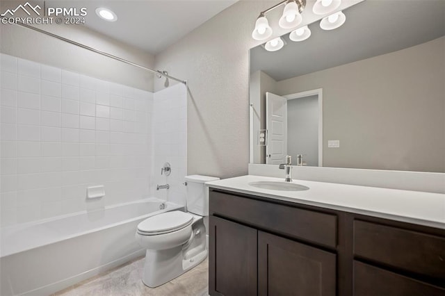 full bathroom featuring vanity, shower / bath combination, and toilet