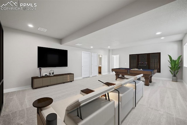 living room with light colored carpet and pool table