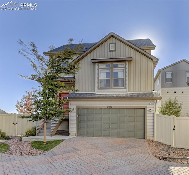 view of front of property featuring a garage