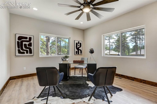 home office featuring ceiling fan and hardwood / wood-style floors