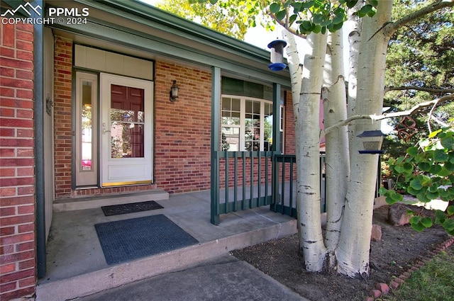 property entrance with a porch