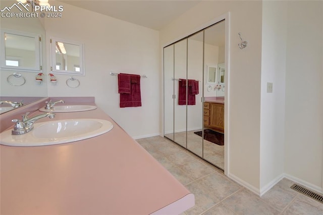 bathroom featuring vanity and tile patterned floors