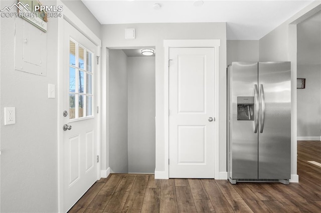 entrance foyer with dark hardwood / wood-style floors