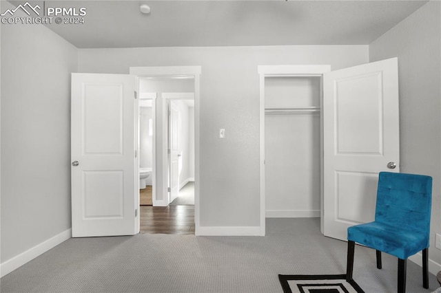 carpeted bedroom with a closet