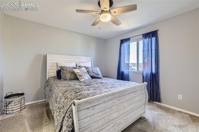 bedroom with ceiling fan and carpet flooring