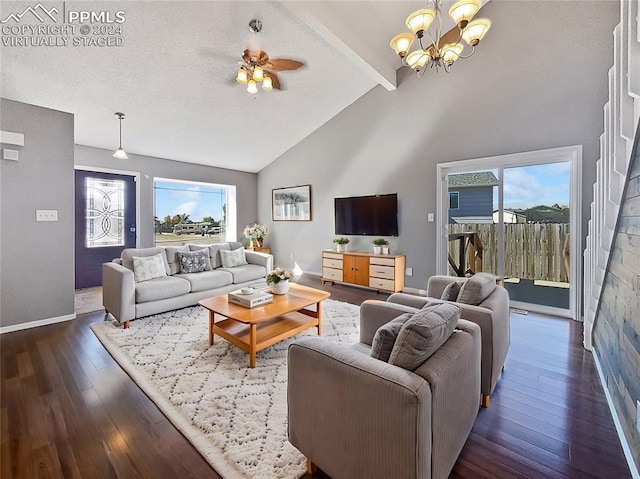 living room featuring ceiling fan with notable chandelier, a textured ceiling, dark hardwood / wood-style flooring, beam ceiling, and high vaulted ceiling