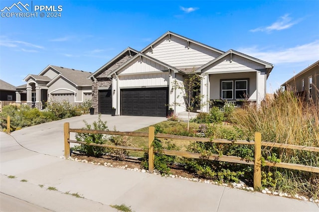 craftsman-style home with a garage