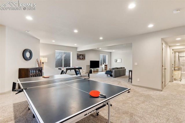 playroom featuring light colored carpet