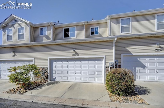 exterior space with a garage