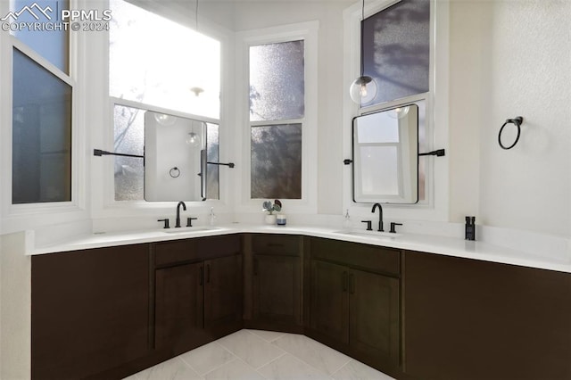 bathroom with vanity and tile patterned floors