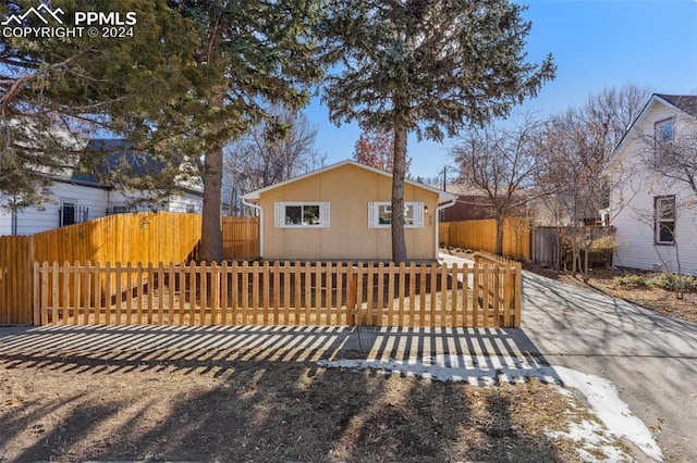 view of front of home with fence private yard