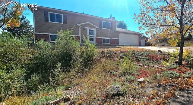 raised ranch with a garage