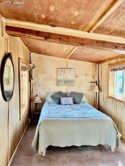 bedroom featuring vaulted ceiling