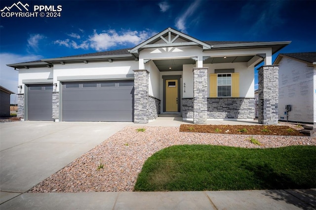 craftsman-style house featuring a garage