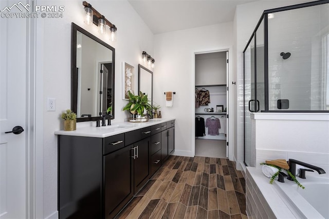 bathroom featuring vanity and walk in shower