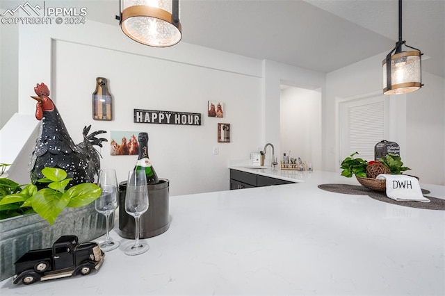 kitchen with sink and pendant lighting