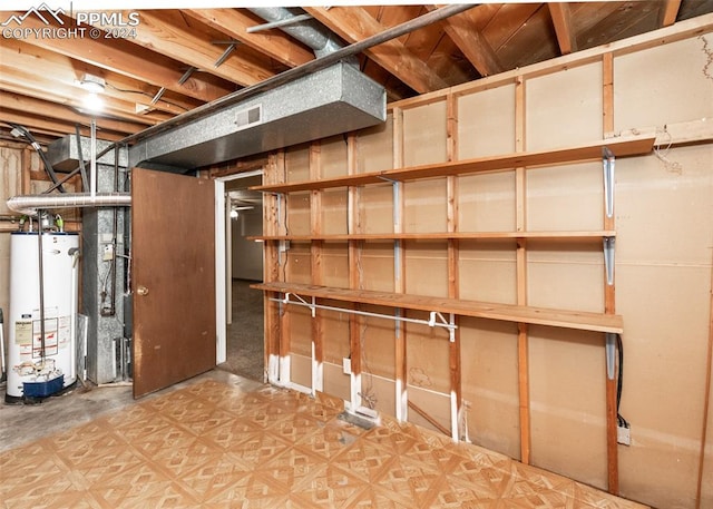 basement featuring water heater