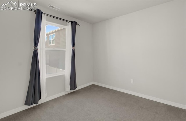 view of carpeted spare room