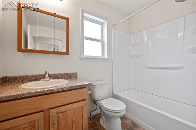 full bathroom with toilet, shower / bathing tub combination, and vanity