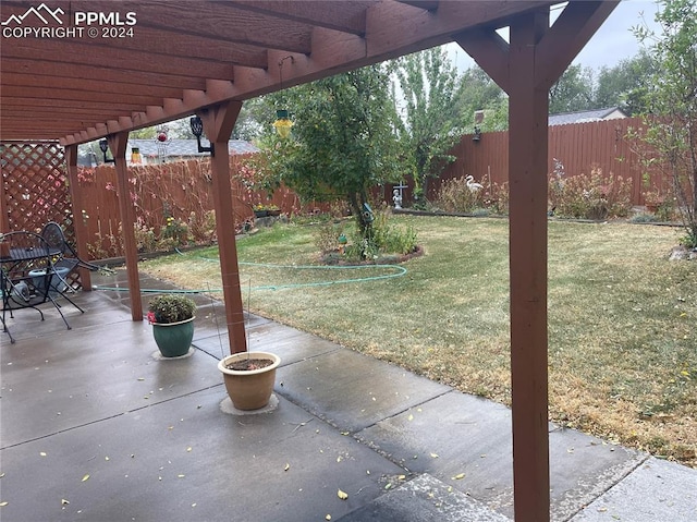 view of patio featuring a pergola