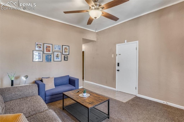 carpeted living room featuring ceiling fan