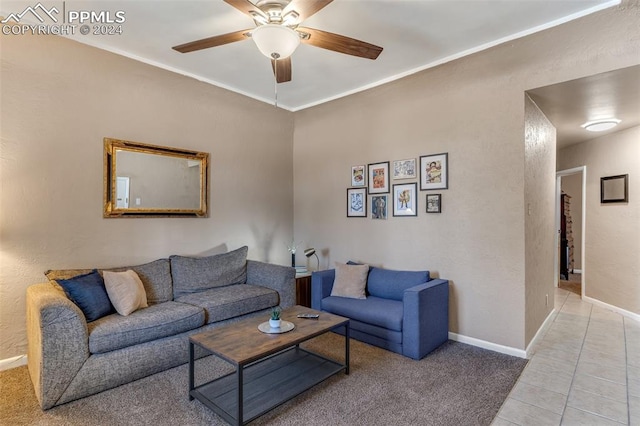 living room featuring light colored carpet and ceiling fan