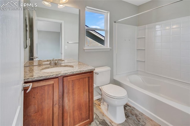 full bathroom with vanity, toilet, and bathtub / shower combination