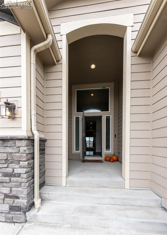 doorway to property with a porch