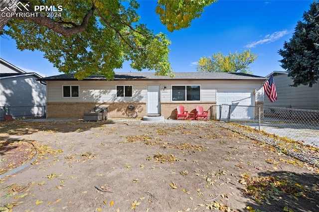 single story home with a garage