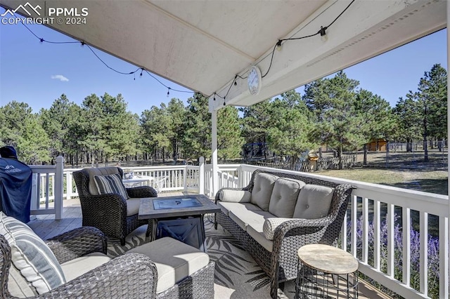 deck with an outdoor hangout area