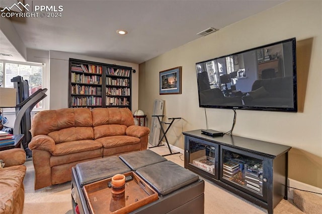 living room featuring light carpet