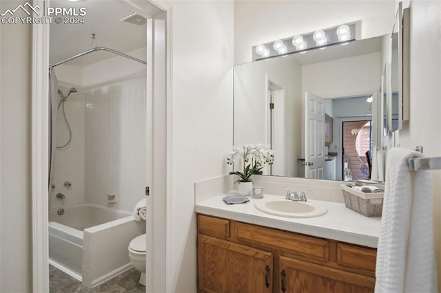 full bathroom featuring vanity, toilet, and bathing tub / shower combination