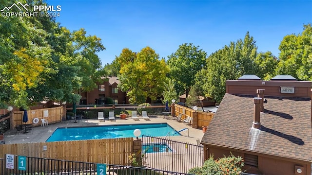 view of swimming pool featuring a patio