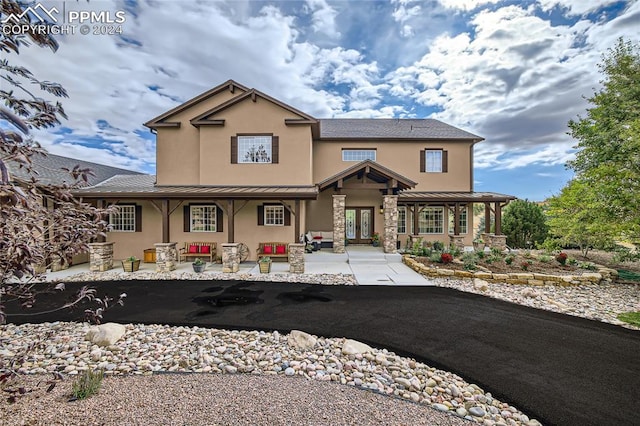 view of front of home featuring covered porch