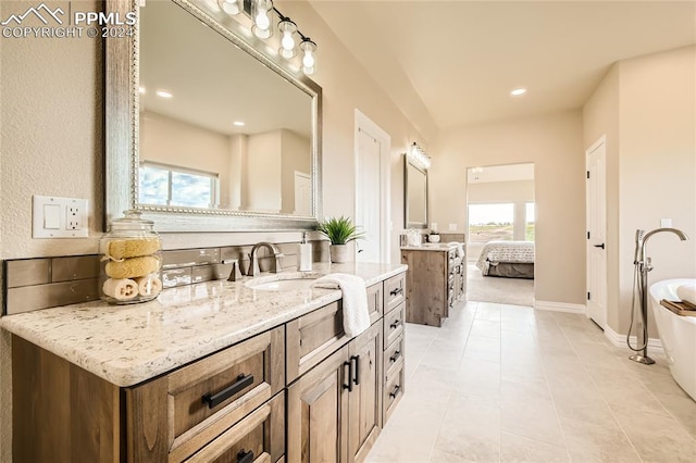 bathroom with vanity and tile patterned floors