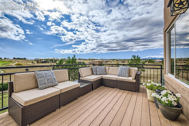 wooden deck with outdoor lounge area