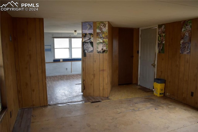 interior space featuring wood walls