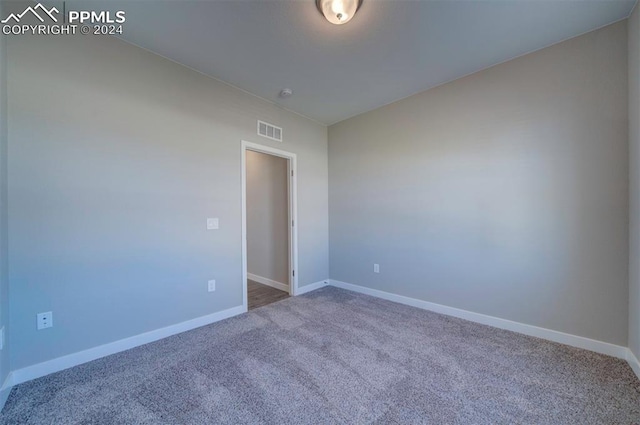 view of carpeted spare room