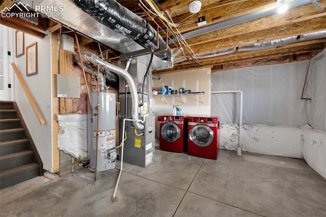 basement with separate washer and dryer and gas water heater